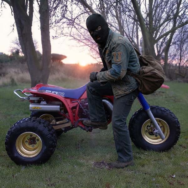 criminal getting on trike
